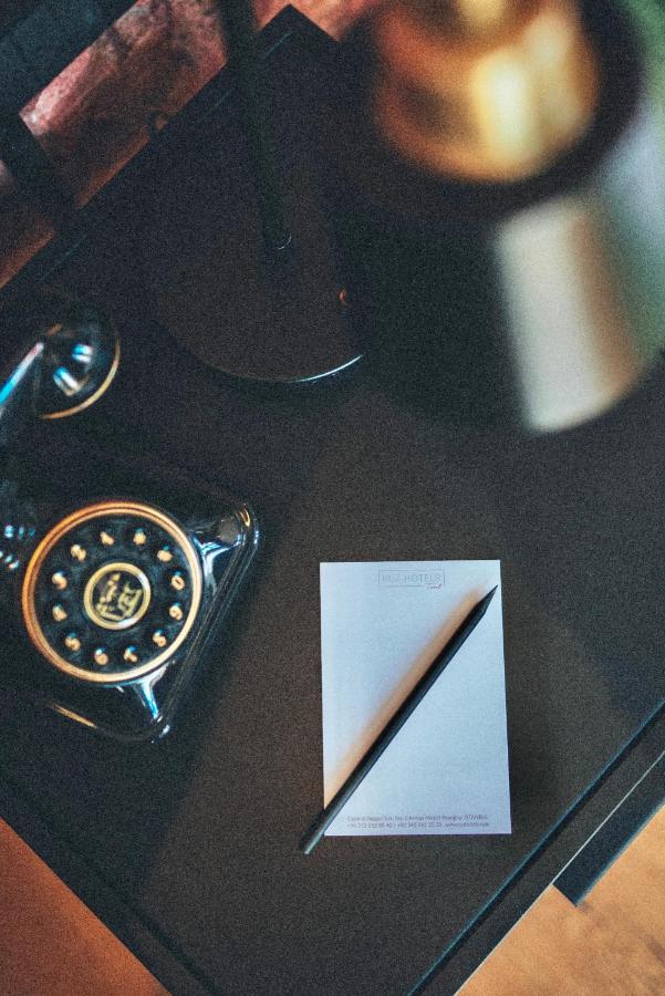 Ruz Hotels Isztambul Kültér fotó A telephone with a built-in memo pad